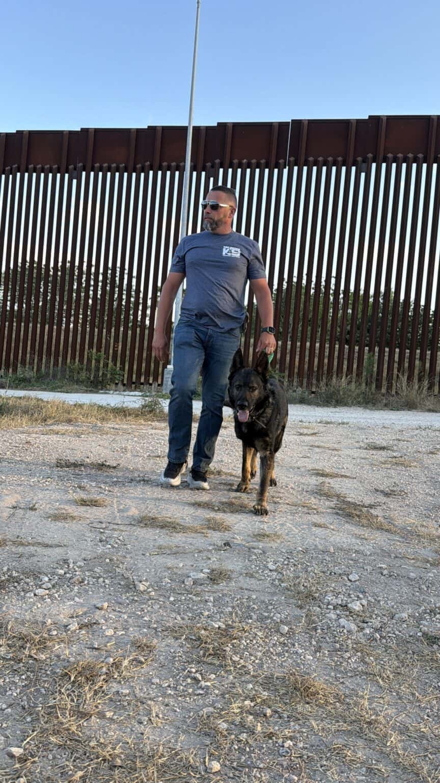 Executive with protection dog